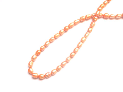 Pearl, rice, 6.5mm, light orange; per string